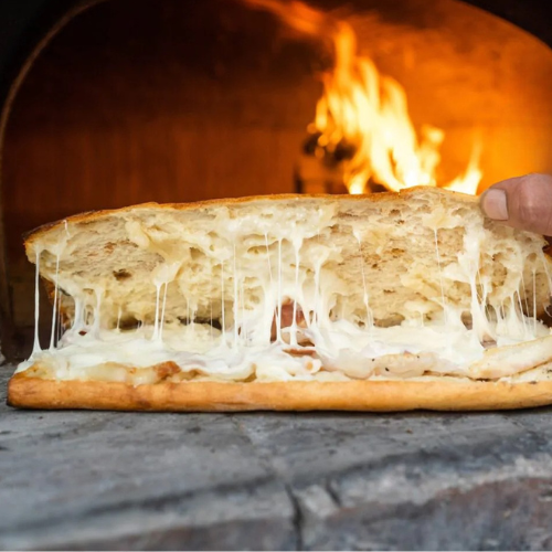 The Story of Panuozzo – The Wood-Fired Sandwich Born from Pizza Dough